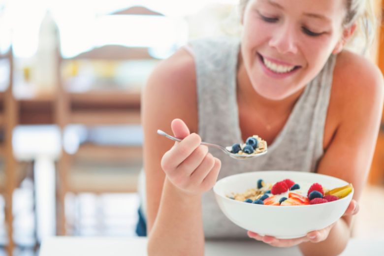 woman eating cereal