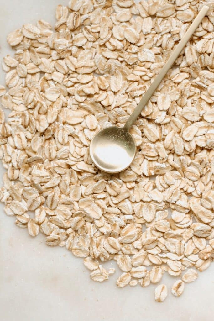 silver spoon on rolled oats